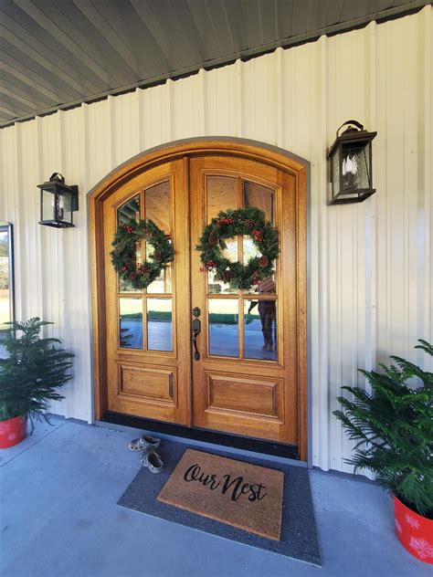 Barndominium front doors - Black front doors offer sophisticated contrast with light-colored interiors and white, beige, tan or brick exteriors. Explore our black entry door gallery.